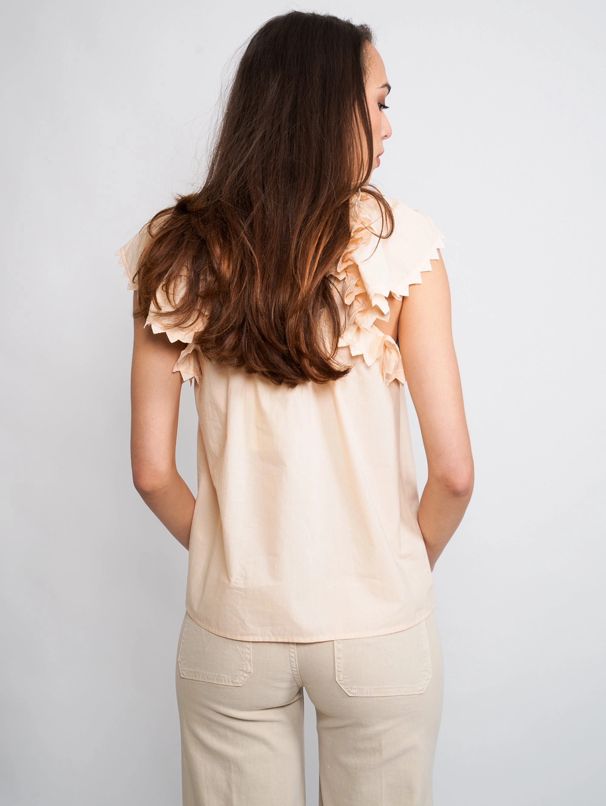 Blouse with cream flounces